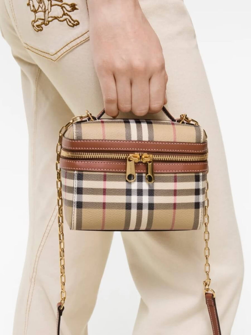 burberry model carrying a bag